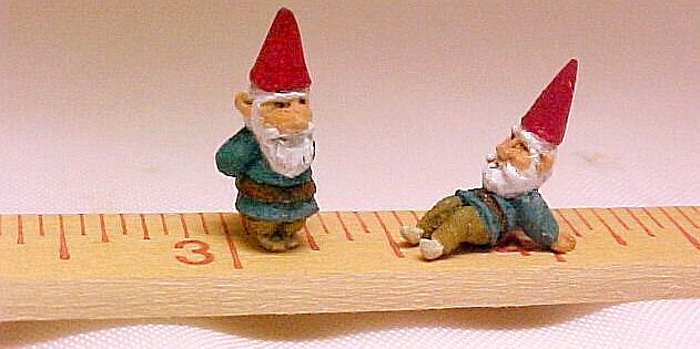 Tiny hand carved hand painted wood gnomes