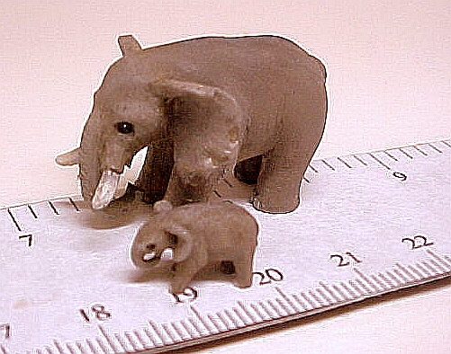 hand carved wood micro miniature elephant with baby