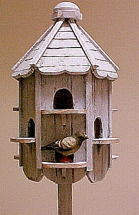 Hand made dovecote with hand carved pigeon