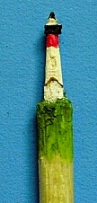 carved lighthouse toothpick
