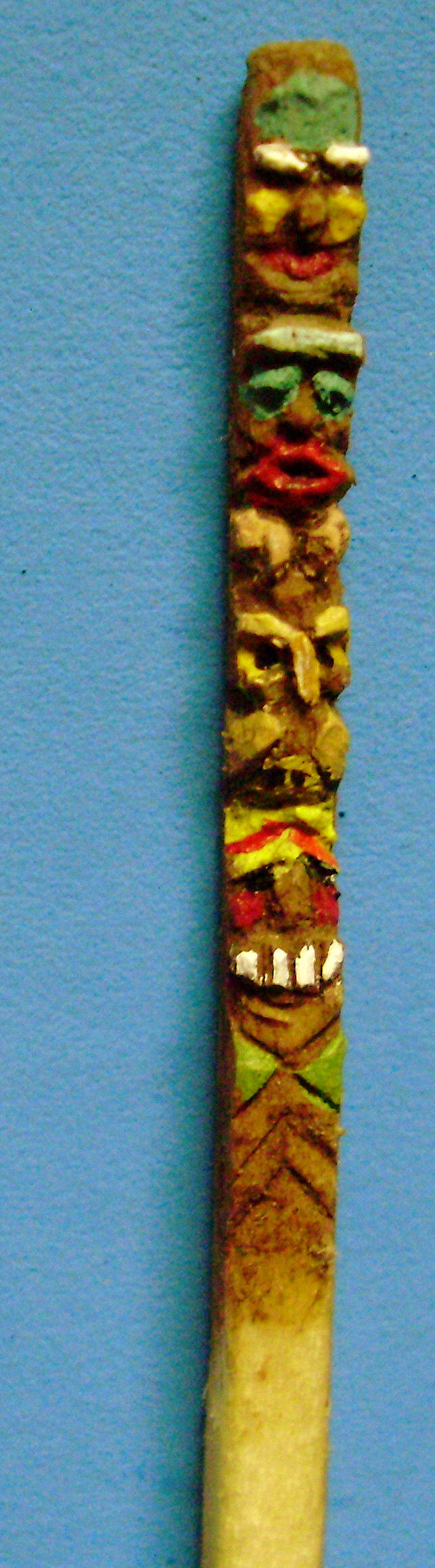 carved totem pole match stick